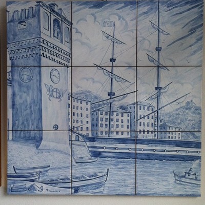 Albisola ceramics Art - Majolica, with a view of the ancient port of Savona and sailboats at anchor.